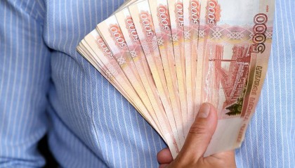 一斤钱100块多少人民币